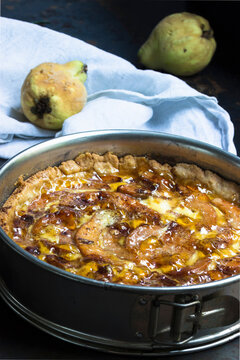 Quince cake, glazed with quince jelly, in a spring form pan
