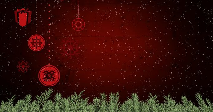 Animation of christmas baubles decoration with snow falling on red