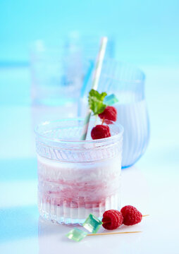 Raspberry and cranberry smoothie with kefir, quark and lime