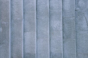 Fototapeta premium Top view of light blue gravel stairs. background texture