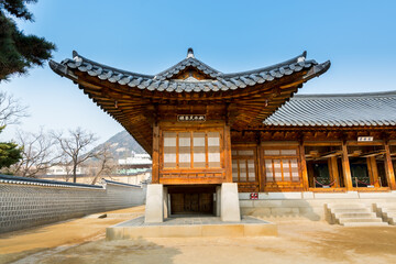 Fototapeta premium Korean wooden traditional house with black tiles in Gyeongbokgung, also known as Gyeongbokgung Palace or Gyeongbok Palace, the main royal palace of Joseon dynasty.