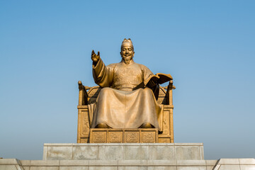 Naklejka premium Statue of the Sejong daewang, also called the Sejong the Great, the fourth king of Joseon-dynasty of Korea, and the alphabet of Korean Language