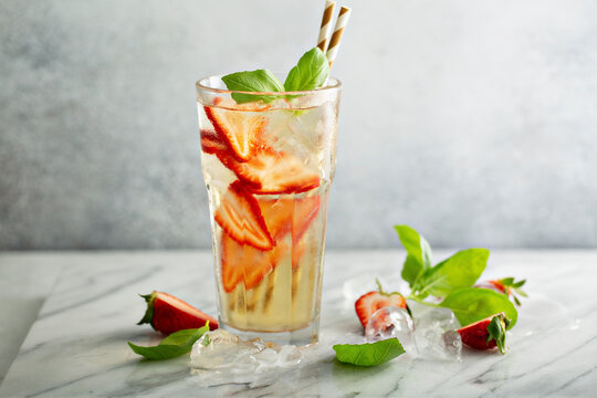 Iced green tea with strawberries and basil