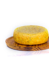 Tasty spanish omelette on a wooden tray on white background