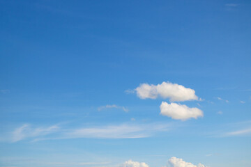 Double White rounded cloud, a lonely little cloud in the clear sky with copy space for texture.