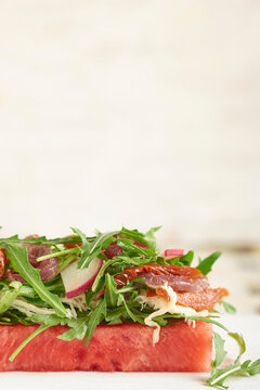 Watermelon with arugula