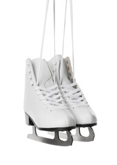 Pair of figure ice skates hanging on white background