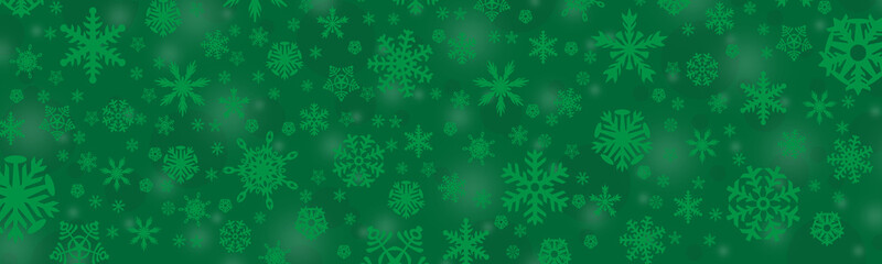 green christmas background with snowflakes