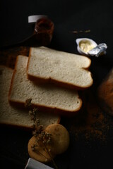 food photography bread slices on black background