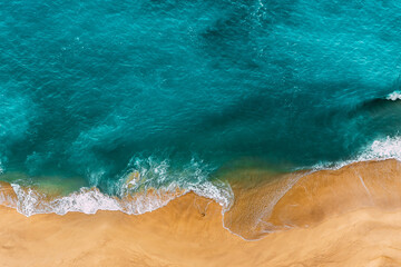 Beautiful sandy beach with turquoise water. Wild beach with beautiful clear sea. Yellow sand with...