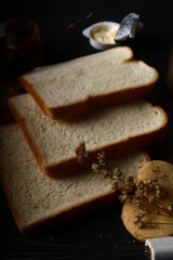 food photography bread slices on black background
