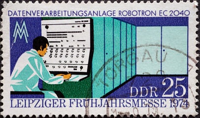 GERMANY, DDR - CIRCA 1974 : a postage stamp from Germany, GDR showing a data processing system...