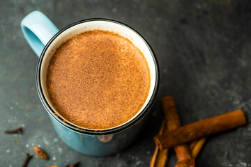 Masala tea (masala chai). Hot Indian drink based on milk and tea with the addition of spices and herbs.