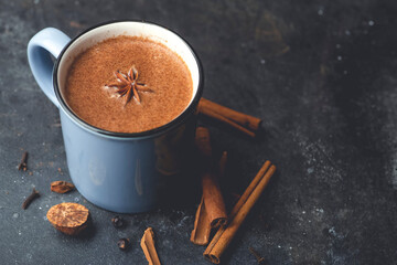 Masala tea (masala chai). Hot Indian drink based on milk and tea with the addition of spices and...