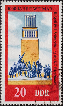 GERMANY, DDR - CIRCA 1975 : a postage stamp from Germany, GDR showing a memorial in the Buchenwald memorial near Weimar 1000th years