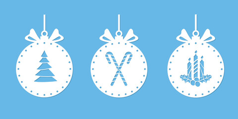 Fototapeta na wymiar Christmas balls with a silhouette for cutting. Christmas ornament stencil. Xmas tree drawing, candy cane, candles and holly. Ball with a bow. Window decoration, craft, laser carving from wood. Vector