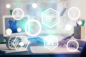 Social network theme hologram over woman's hands writing background. Concept of international people connect. Double exposure