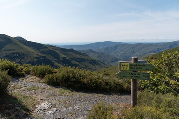 Courel mountain landscape and hiking sign with copy space