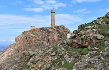 Fototapeta na wymiar Faro Vilan, the oldest electric lighthouse (1896) in Spain at famous Costa da Morte Region. Camariñas, Coruña, Galicia, Spain.