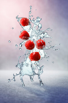 Raspberries with a splash of water