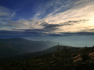 Fog over a mountain valley. Autumn in the mountains.