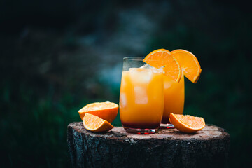 Two glasses of Vodka Sunrise made with orange juice and grenadine