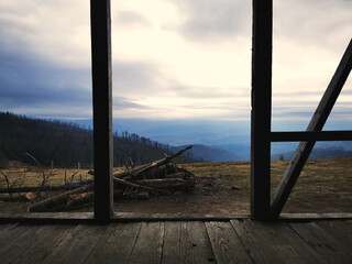 View of the mountain valley from the wooden shepherd's house.