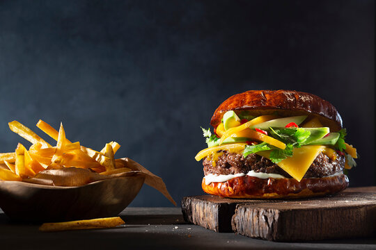 Burger with mango and avocado, served with fries