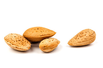 almond nuts in close-up, isolated on white background