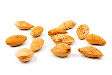 almond nuts in close-up, isolated on white background