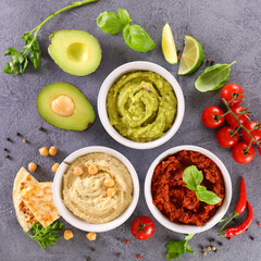 assorted of vegan hummus and fresh ingredients