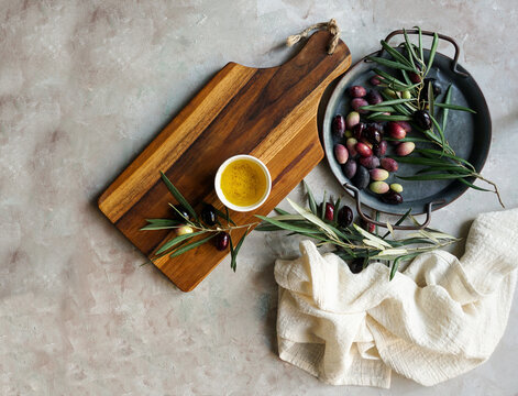 Olive tree branch, napkin, olive oil