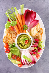 Obraz na płótnie Canvas assorted of fresh vegetables, bread toast and dip