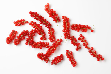 Bunches of Red Currant Berries Isolated On a White Background	
