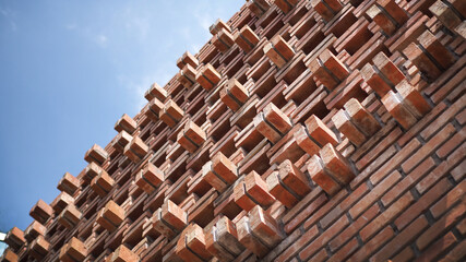 Close up pattern of brick wall design with shade and shadow