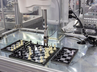 close-up view of robot playing chess.