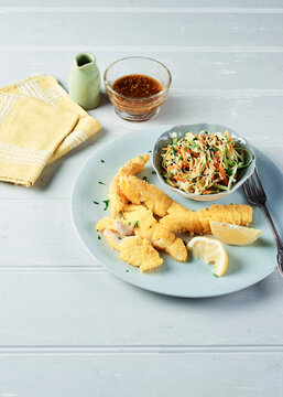 Crispy polenta cod with summer slaw and tahini dressing