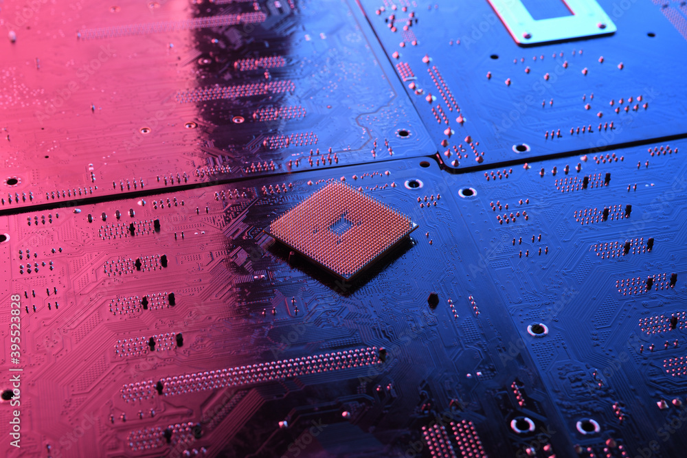 Poster computer cpu processor chip on circuit board ,motherboard background. close-up. with red-blue lighti