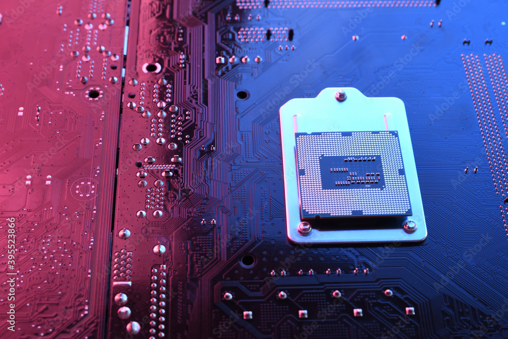 Poster computer cpu processor chip on circuit board ,motherboard background. close-up. with red-blue lighti