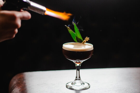 Espresso martini with flamb�ed pandan leaves