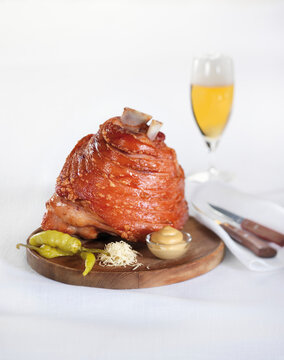 Pork knuckle with pepperoni, horseradish, mustard and beer