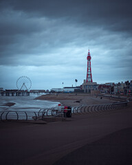 The skyline of Blackpool with the tower and ferris wheel of the pier on the horizon