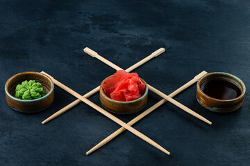 Fototapeta na wymiar composition of wasabi, ginger and soy sauce for sushi