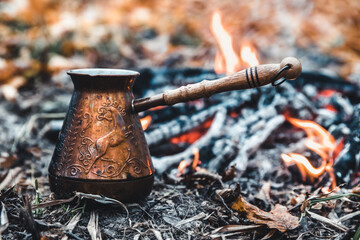 Making coffee at the stake. Make coffee or tea on the fire of nature. Burned fire. A place for fire.