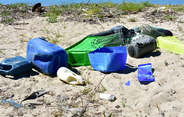 Beach with plastic pollution on sand at famous Rias Baixas Region. Coruña Province, Galicia, Spain.