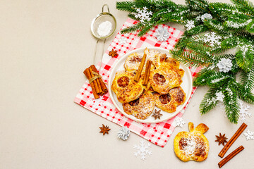 Obraz na płótnie Canvas Christmas or New Year sweet apple puffs, fresh homemade bakery