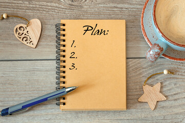 2021 Plan - inscription on a notebook and wooden cubes