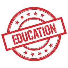 EDUCATION text written on red vintage round stamp.
