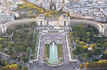 Parisian cityscape at sunset from Eiffel Tower. View of Trocadero with esplanade, gardens,...