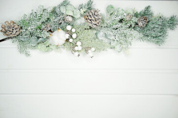 winter background with fir branches cones and snow